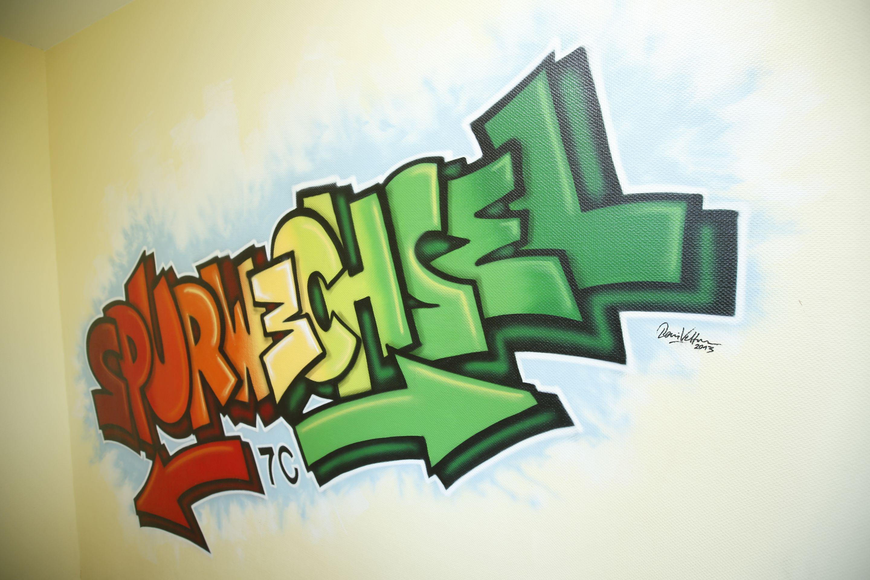 Das Bild zeigt einGrafitti, das das Wort "Spurwechsel" zeigt